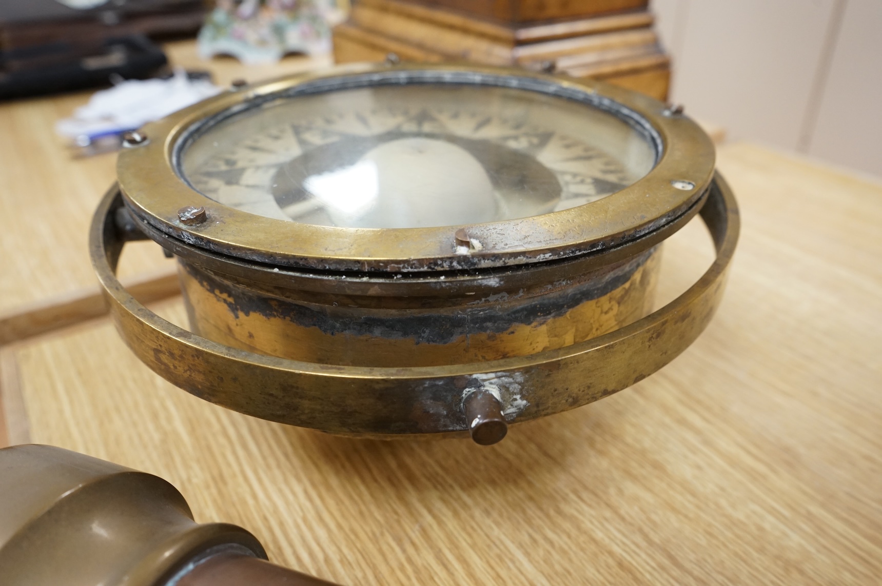 A brass ship's compass in gimbal and a copper water hydrant, 95.5cm